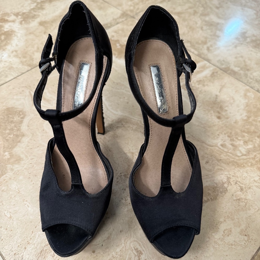 **SOLD**.  Halston black platform sandal